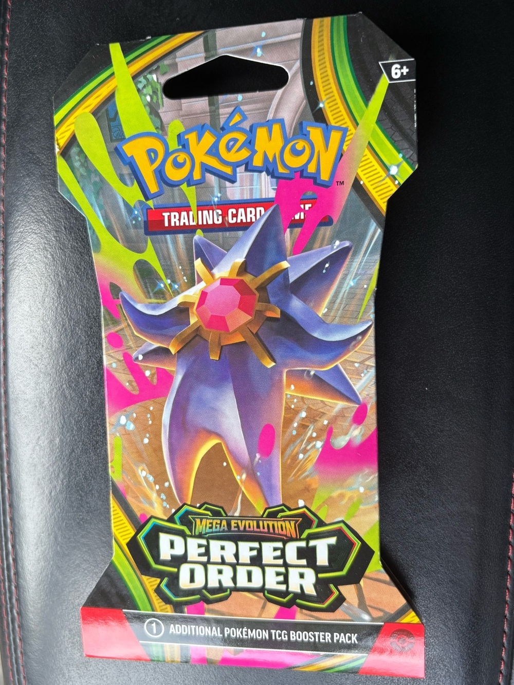 Pokemon Booster Pack with Purple, Pink, Green, Yellow Artwork